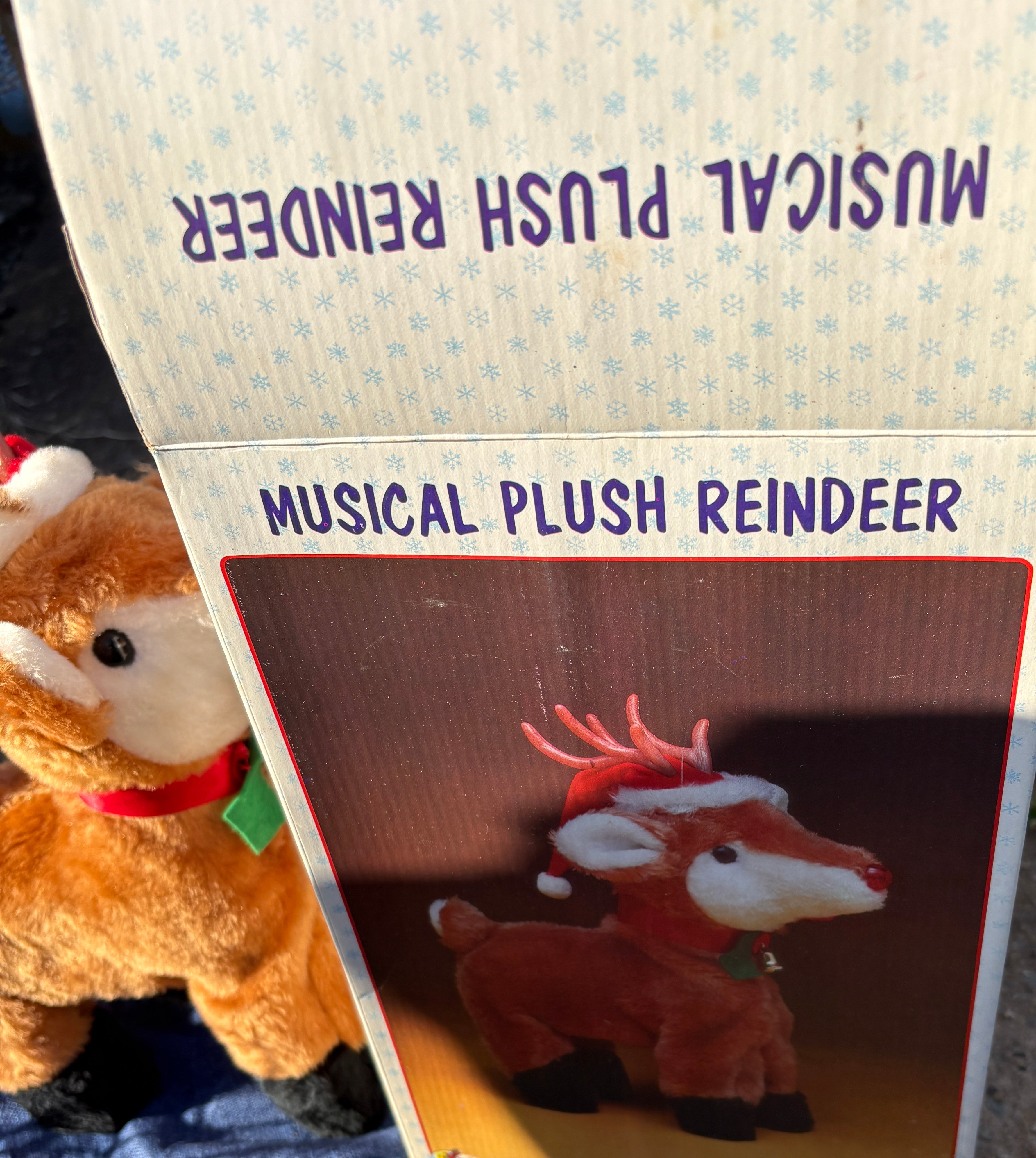 Reindeer Musical Plush (as is has spot on fur hat.)