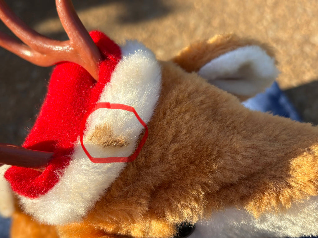 Reindeer Musical Plush (as is has spot on fur hat.)
