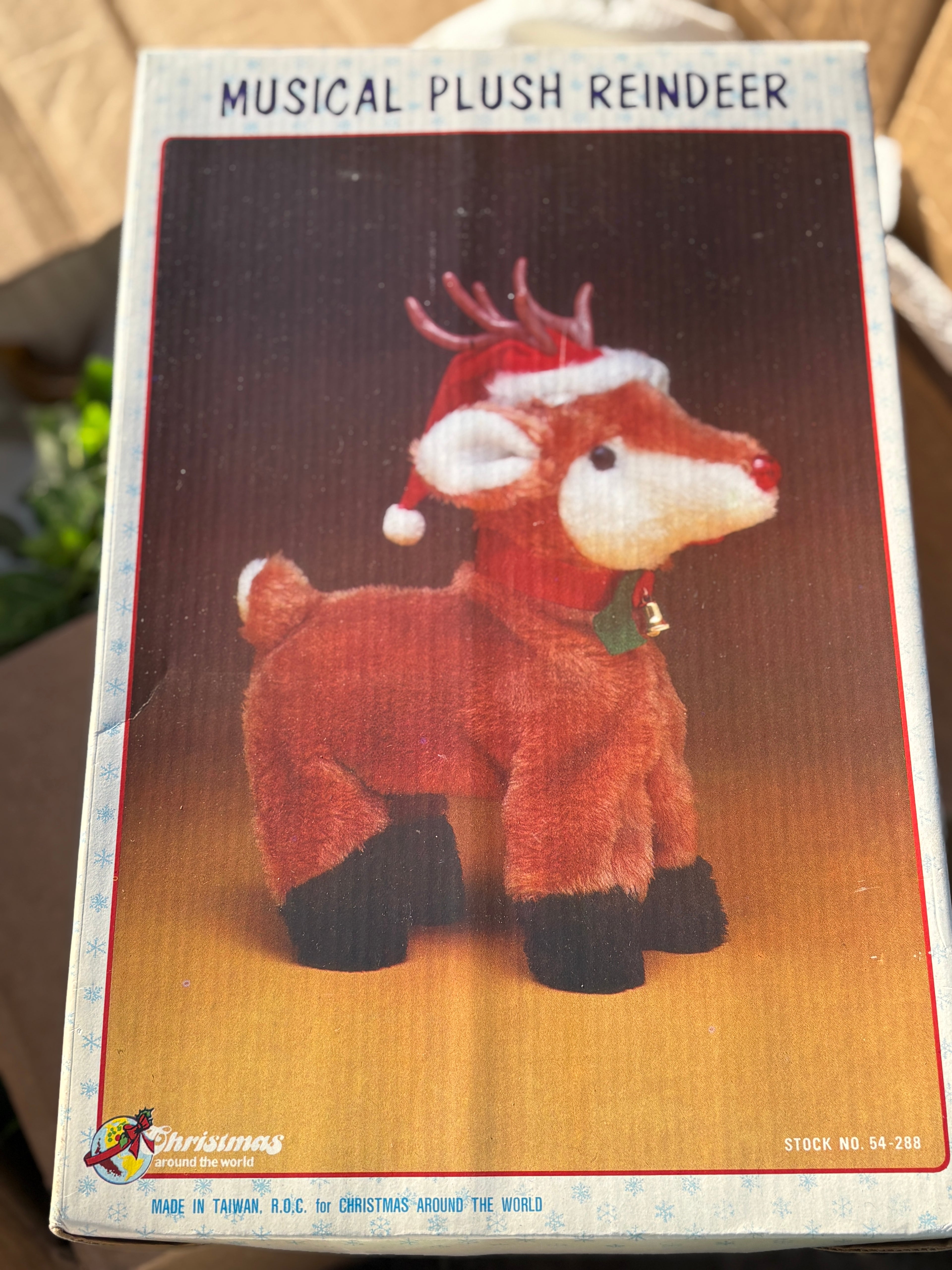 Reindeer Musical Plush (as is has spot on fur hat.)