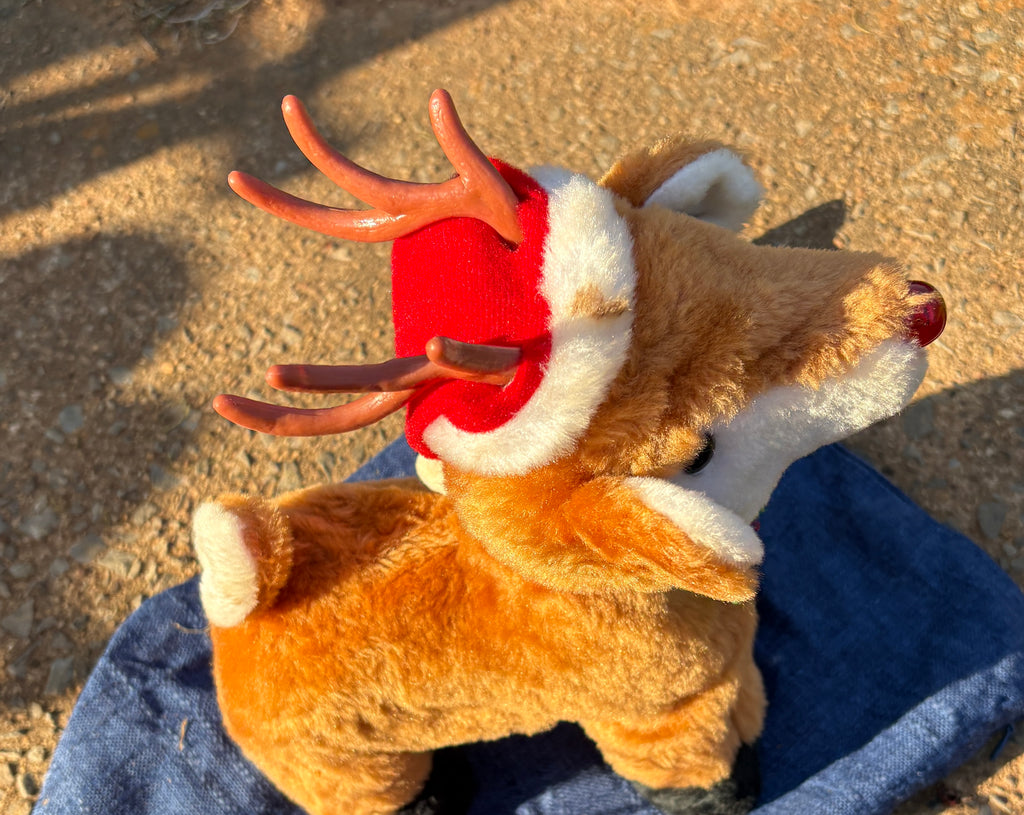 Reindeer Musical Plush (as is has spot on fur hat.)