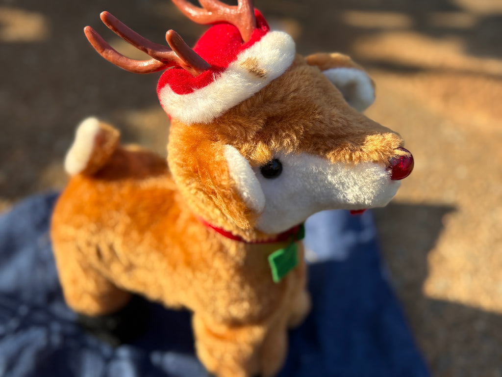 Reindeer Musical Plush (as is has spot on fur hat.)